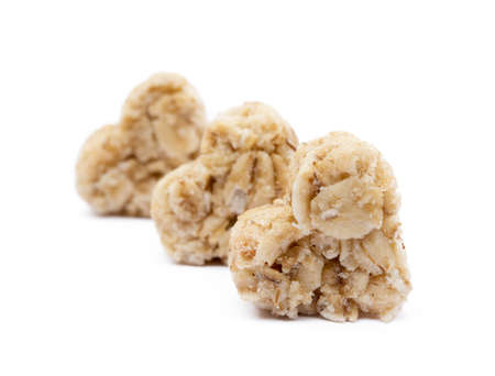 Oatmeal heart dessert isolated on white backgroundの写真素材