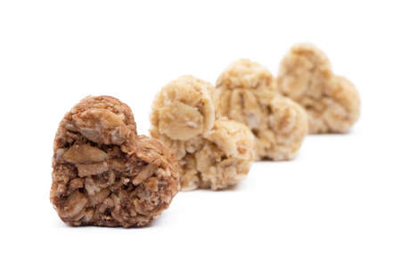 Oatmeal heart dessert isolated on white backgroundの写真素材