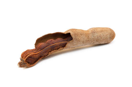 Ripe sweet tamarind isolated on white backgroundの写真素材