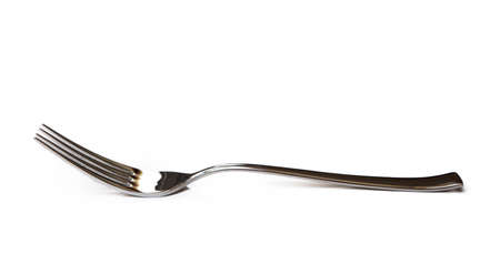 Glossy cutlery, fork isolated on white backgroundの写真素材