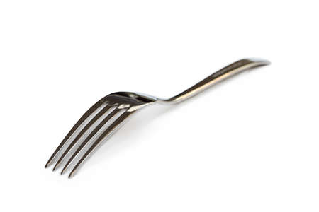 Glossy cutlery, fork isolated on white backgroundの写真素材