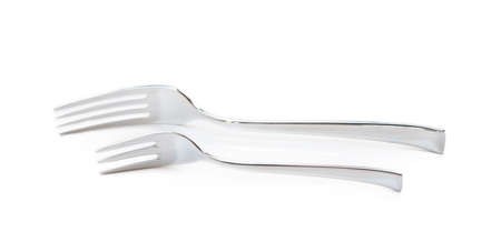Glossy cutlery, fork isolated on white backgroundの写真素材