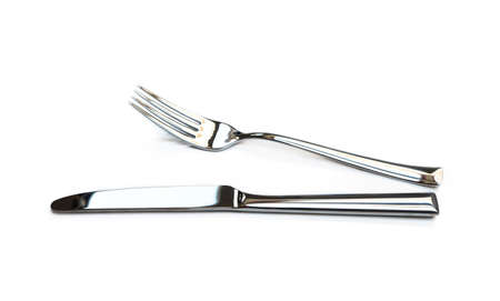 Glossy cutlery, fork isolated on white backgroundの写真素材