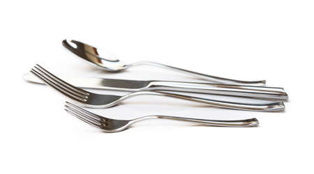 Glossy cutlery, fork, knife isolated on white backgroundの写真素材