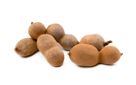 Ripe sweet tamarind isolated on white backgroundの写真素材