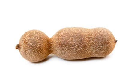 Ripe sweet tamarind isolated on white backgroundの写真素材