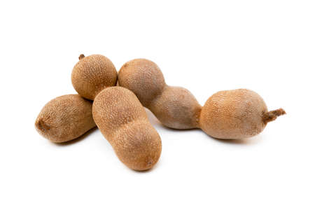 Ripe sweet tamarind isolated on white backgroundの写真素材