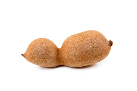 Ripe sweet tamarind isolated on white backgroundの写真素材