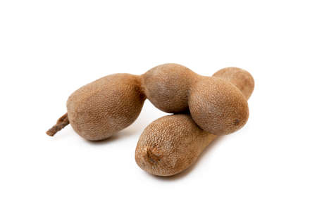 Ripe sweet tamarind isolated on white backgroundの写真素材