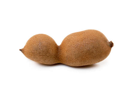 Ripe sweet tamarind isolated on white backgroundの写真素材