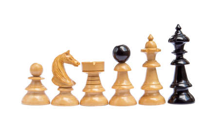 Old chess pieces isolated on white backgroundの写真素材