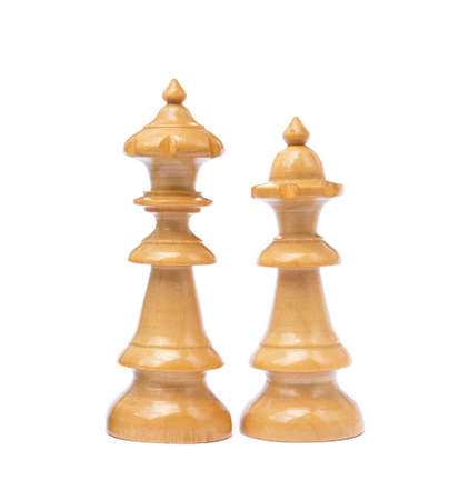 Old chess pieces isolated on white backgroundの写真素材