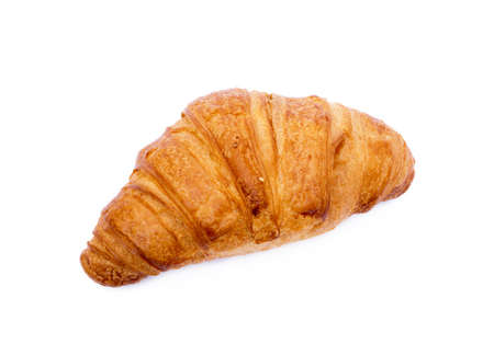 Fresh buttery croissant isolated on white backgroundの写真素材