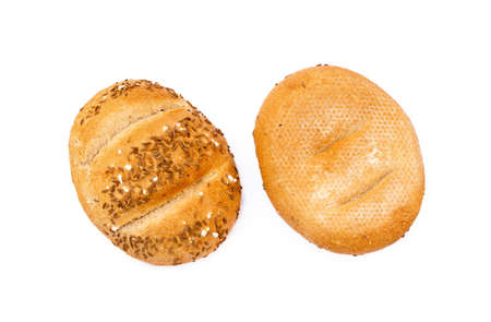 Crispy bun sprinkled with caraway isolated on white backgroundの写真素材