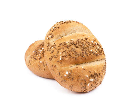 Crispy bun sprinkled with caraway isolated on white backgroundの写真素材