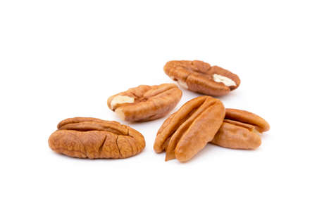 Fresh pecan nuts isolated on white backgroundの写真素材
