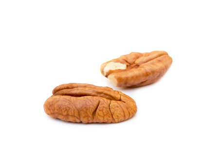 Fresh pecan nuts isolated on white backgroundの写真素材