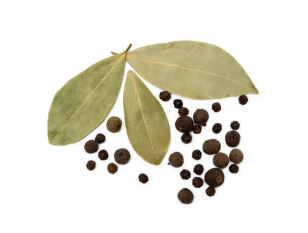 Bay leaf, allspice and pepper isolated on white backgroundの写真素材