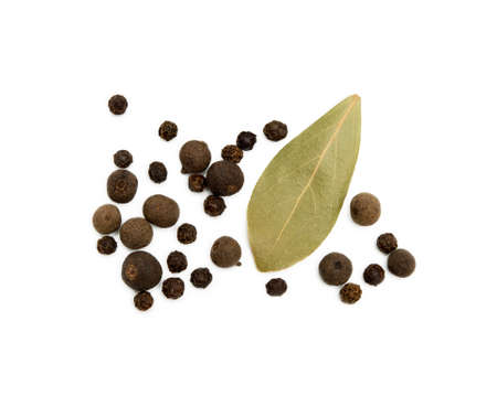 Bay leaf, allspice and pepper isolated on white backgroundの写真素材