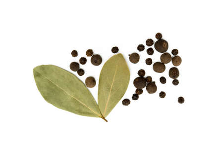 Bay leaf, allspice and pepper isolated on white backgroundの写真素材