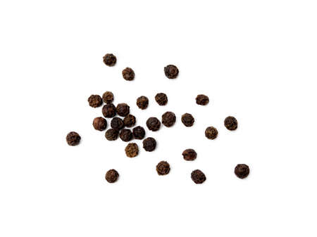 Scattered pepper isolated on white backgroundの写真素材