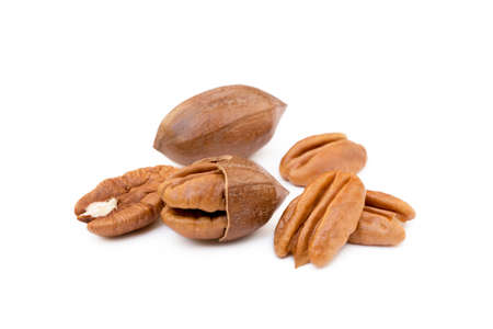 Fresh pecan nuts isolated on white backgroundの写真素材