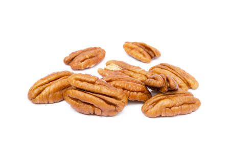 Fresh pecan nuts isolated on white backgroundの写真素材