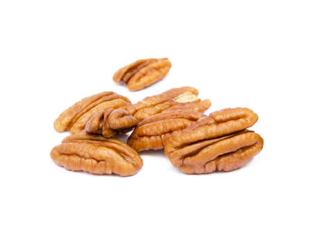 Fresh pecan nuts isolated on white backgroundの写真素材