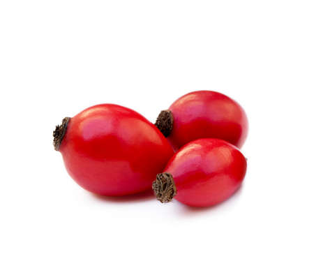 Ripe rose hip isolated on white backgroundの写真素材