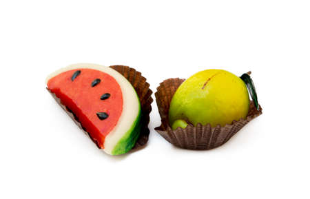 Fresh marzipan fruits isolated on a white backgroundの写真素材
