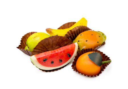 Fresh marzipan fruits isolated on a white backgroundの写真素材