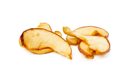 Dried sliced apples isolated on white backgroundの写真素材