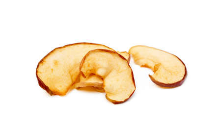 Dried sliced apples isolated on white backgroundの写真素材