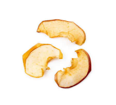 Dried sliced apples isolated on white backgroundの写真素材