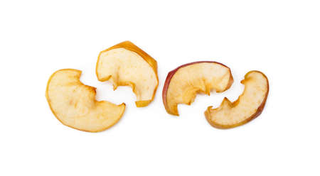 Dried sliced apples isolated on white backgroundの写真素材