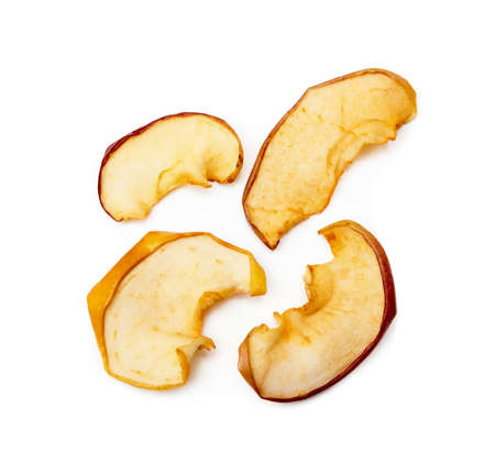 Dried sliced apples isolated on white backgroundの写真素材