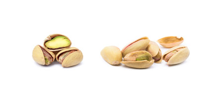 Pile of fresh pistachios isolated on white backgroundの写真素材