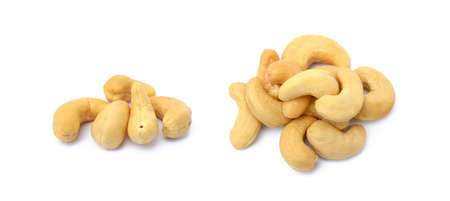 Roasted salted cashews isolated on a white backgroundの写真素材