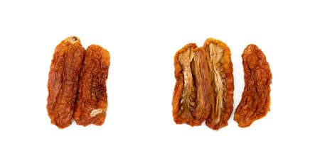 Dried red tomatoes isolated on white backgroundの写真素材