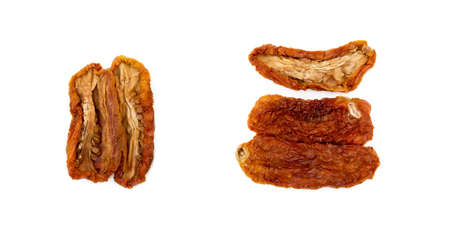 Dried red tomatoes isolated on white backgroundの写真素材