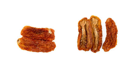 Dried red tomatoes isolated on white backgroundの写真素材