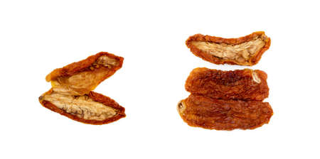 Dried red tomatoes isolated on white backgroundの写真素材