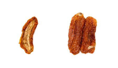 Dried red tomatoes isolated on white backgroundの写真素材