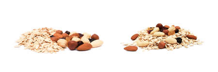 Mix nuts, raisins and oatmeal isolated on white backgroundの写真素材