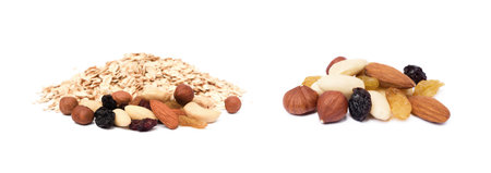 Mix nuts, raisins and oatmeal isolated on white backgroundの写真素材