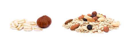 Mix nuts, raisins and oatmeal isolated on white backgroundの写真素材