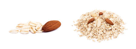 Mix nuts, raisins and oatmeal isolated on white backgroundの写真素材