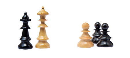 Old chess pieces isolated on white backgroundの写真素材