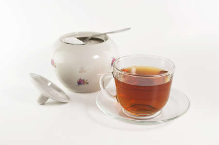 cup of tea and sugar on white backgroundの写真素材