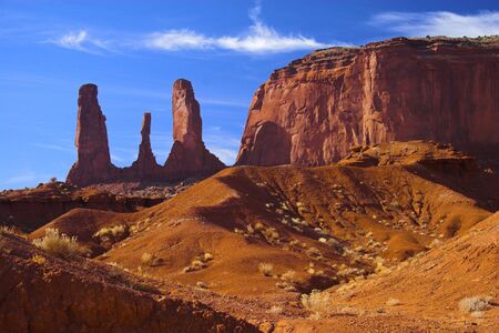 Semi-desert and the red rocks of the Navajo National Monument with on the background of the famous table mountainsの写真素材